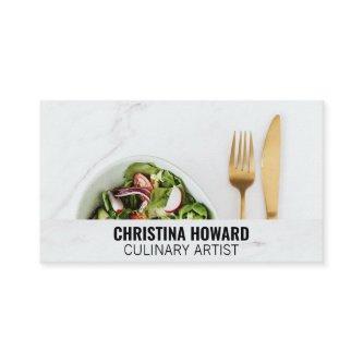 Salad and Silverware on Marble