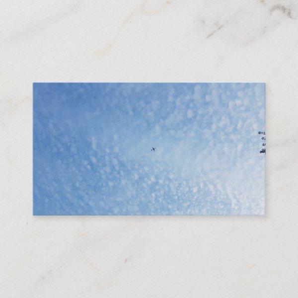 Speckled White Cloud Blue Sky Plane