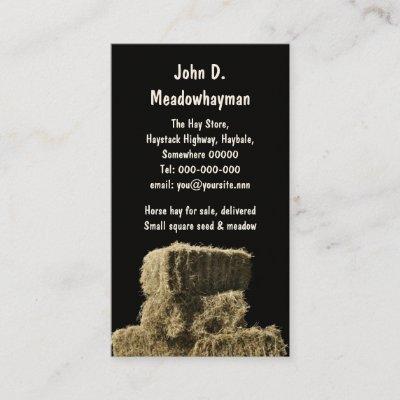 Square hay bales in a stack black background