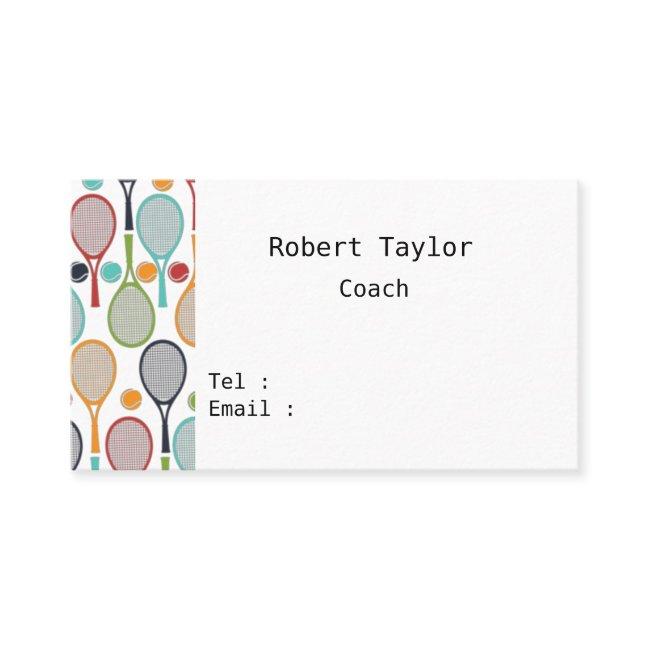 Tennis ball and colorful racket on white