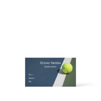 Tennis Coach Instructor with tennis ball on Blue