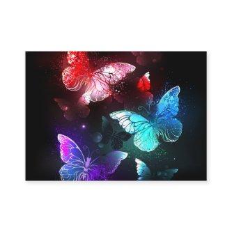 Three Glowing Butterflies on night background