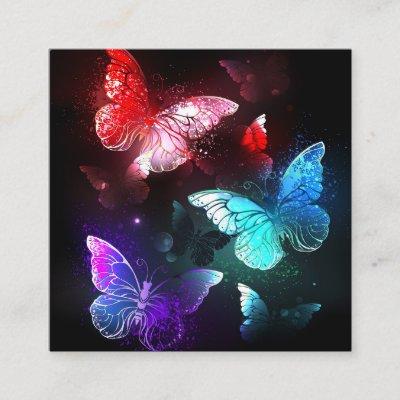 Three Glowing Butterflies on night background Square