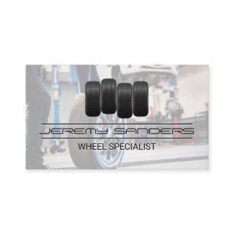 Tire and Wheel Service | Man working on Tires