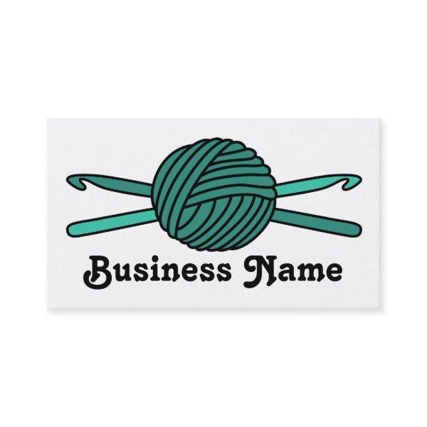 Turquoise Ball of Yarn & Crochet Hooks