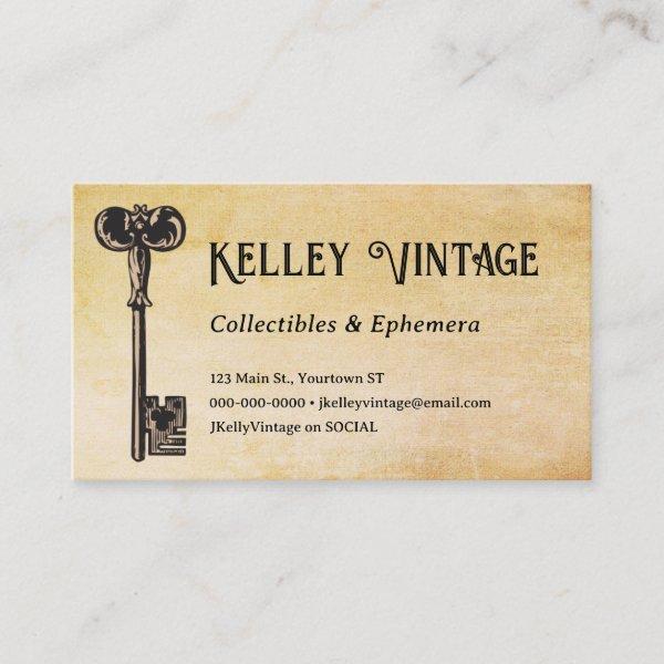 Vintage antiques seller antique key on parchment