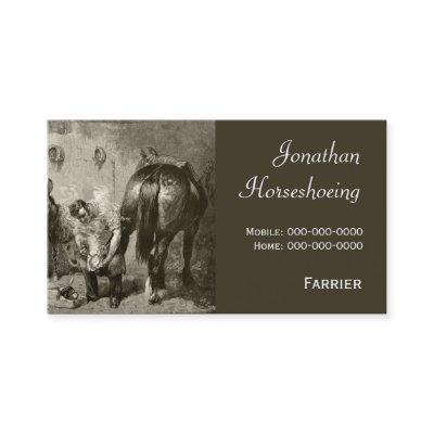 Vintage farrier fitting a hot shoe