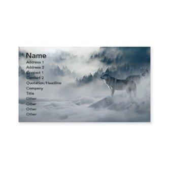 Wolves in Snowy Winter Landscape