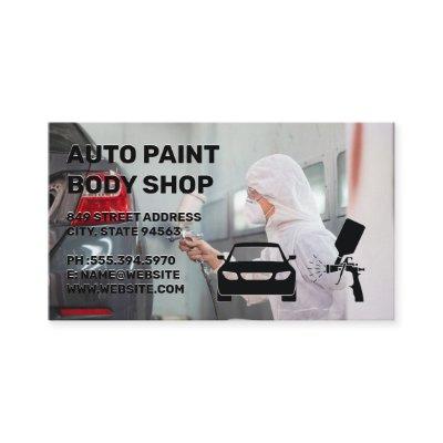Worker Spraying Car with Paint