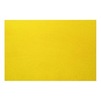 Yellow and orange abstract shapes overlap on a pla wood wall art