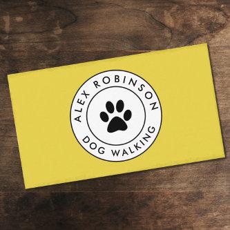 Yellow paw print dog logo