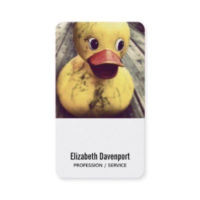 Yellow Rubber Ducky Covered in Dirt