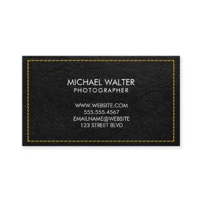 Yellow Stitched Black Leather Background